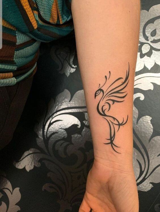 phoenix forearm tattoo design for women 