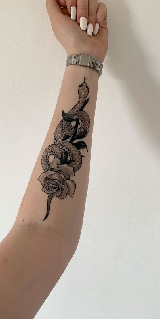 rose flower with snake forearm tattoo design for women