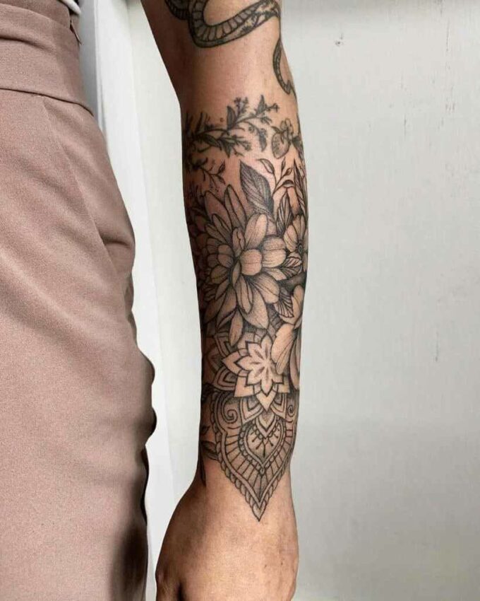 Hawaiian floral girly half sleeve tattoo design 