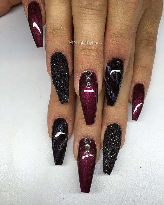 long acrylic coffin glitter with rhinestones maroon and black nails