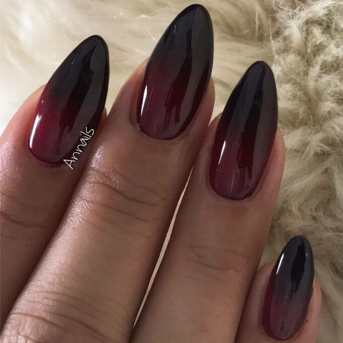glossy round tip maroon and black nails