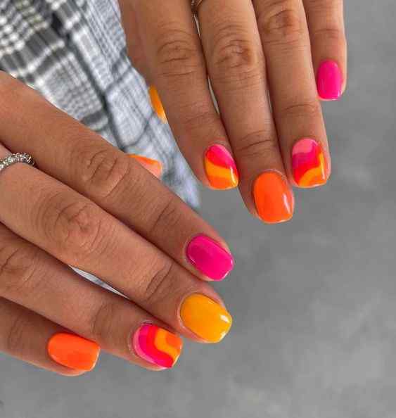 fun short summer orange and pink nails