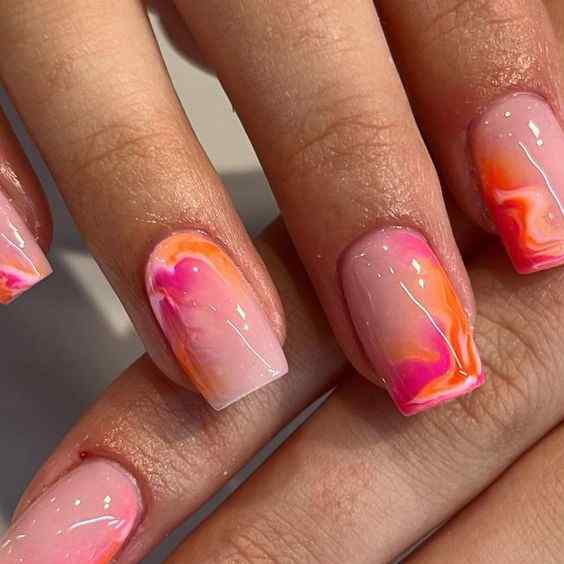 beautiful glossy marble summer orange and pink nails