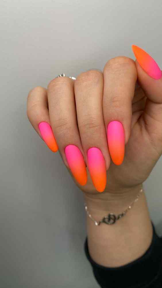 trendy round matte summer orange and pink nails