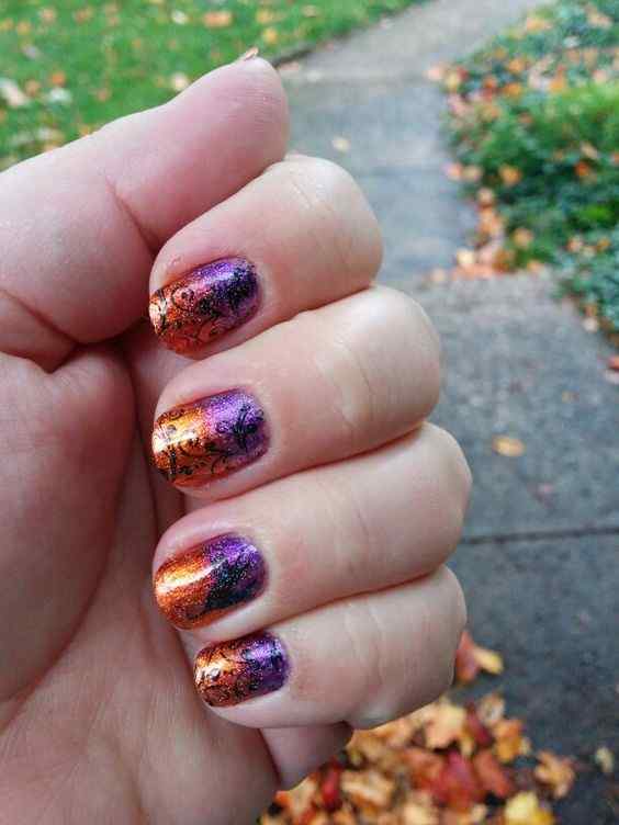 stamped floral with glitter orange and purple nails