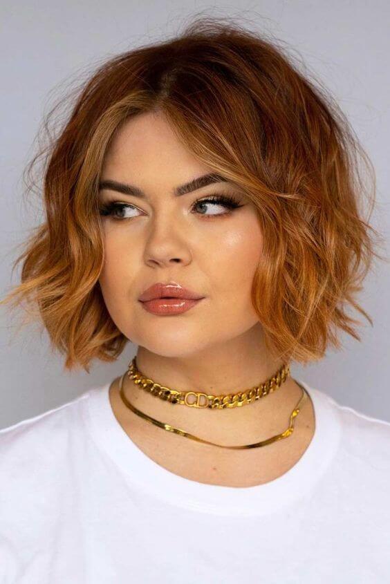 Ginger short wavy shaggy layered bob hairstyle 