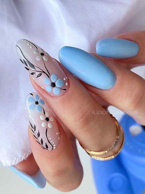white and blue floral with light blue nail designs