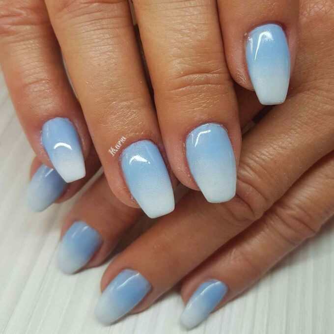 soft glossy short acrylic light blue nails