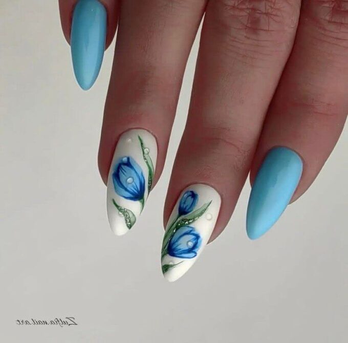 blue flowers on white with light blue round nail designs