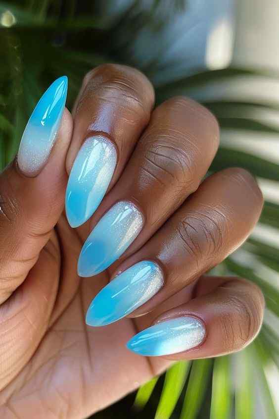 glittery light blue ombre acrylic round nail designs