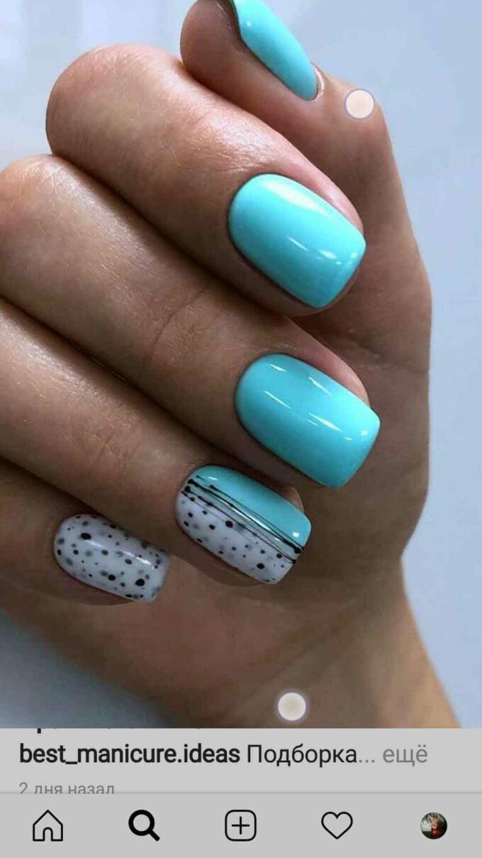 white with black dots and light blue nail designs