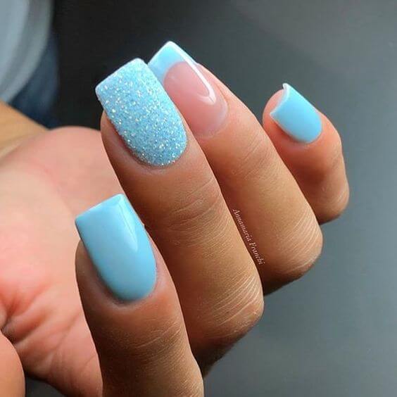 French manicure with glitter and baby blue nail designs