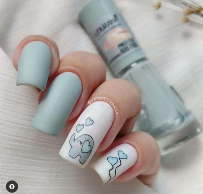 baby elephant and heart balloons art with white and light blue nail designs
