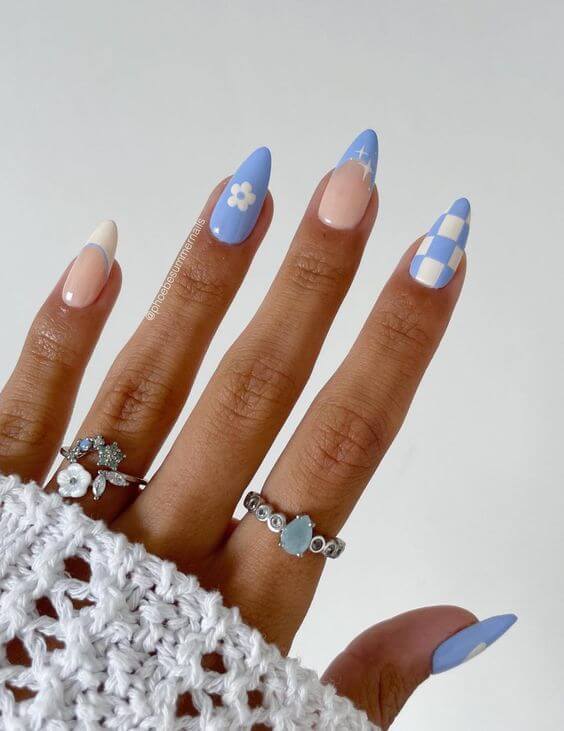 tiny flowers and checker white and light blue nail designs