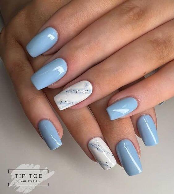 white with marble effect and light blue nail designs