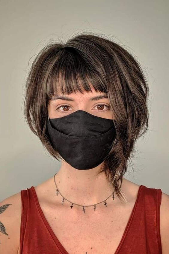 asymmetrical bob with bangs haircut