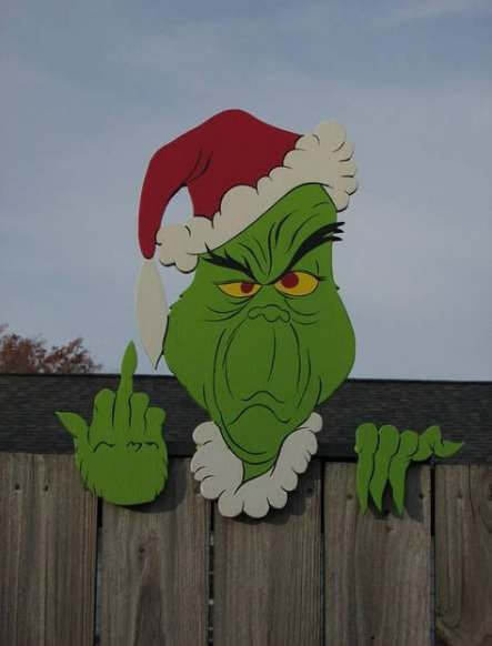 outdoor behind fence grinch christmas decoration