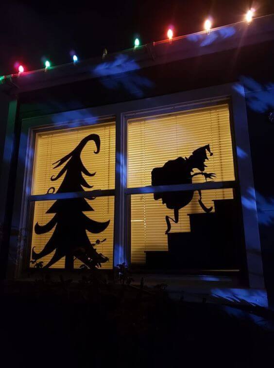 outdoor window silhouette grinch christmas decoration