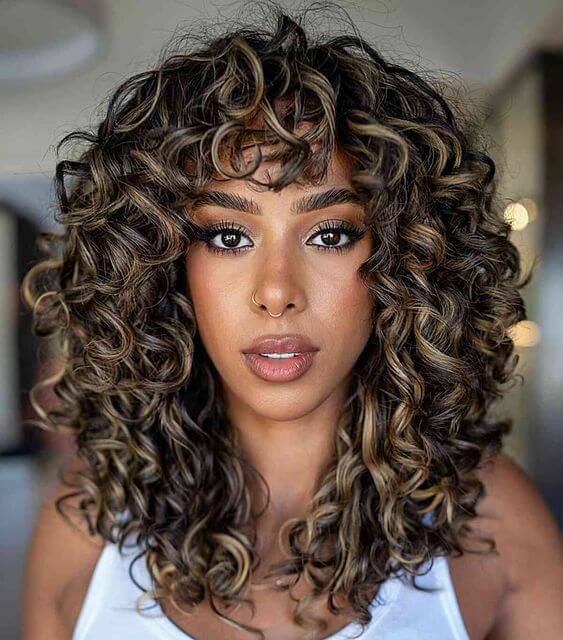 natural curly hair with highlights