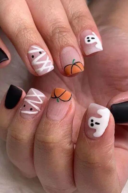 simple halloween pumpkin and ghost nails art designs
