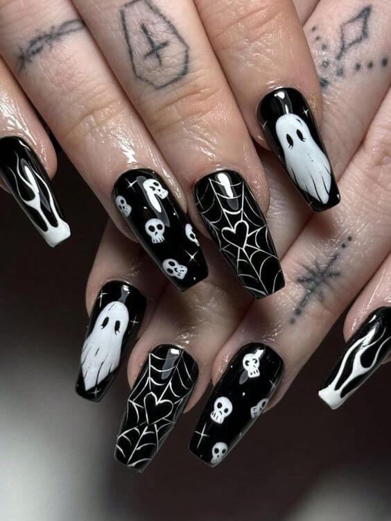 skulls with spider web and ghost nail designs for halloween