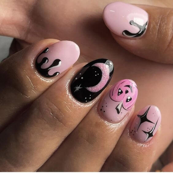cute spooky black and pink halloween nail art designs