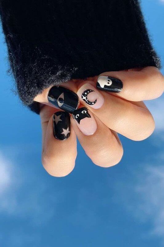 nude and black spooky short nail designs for halloween