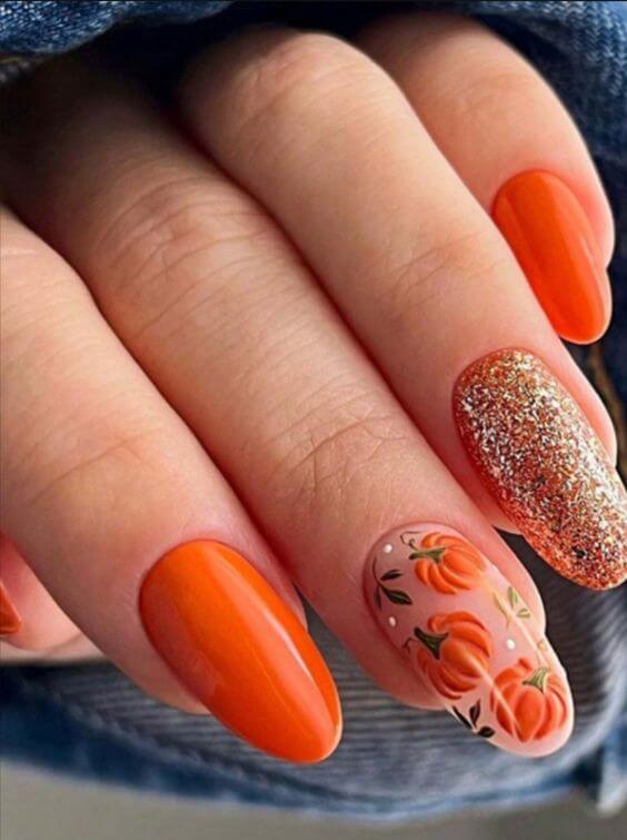 glitter with halloween pumpkin and orange color nail art designs