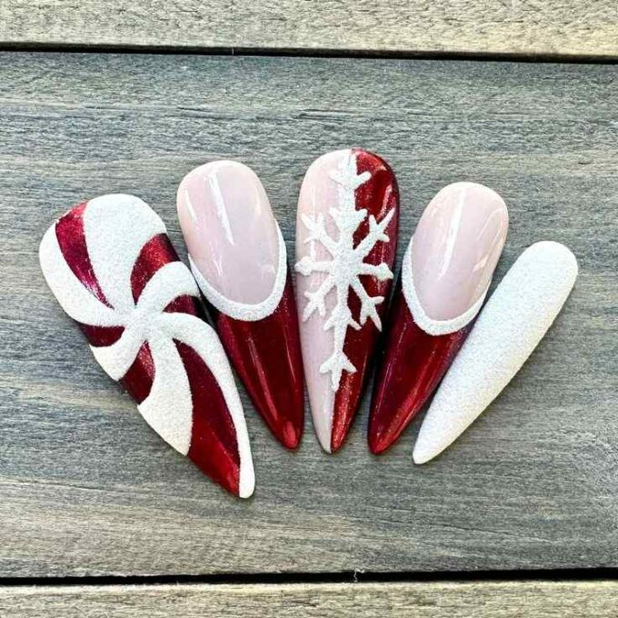 festive almond red and white christmas nail art 