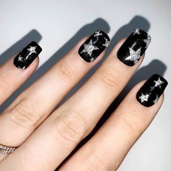 black and silver stars christmas nail designs