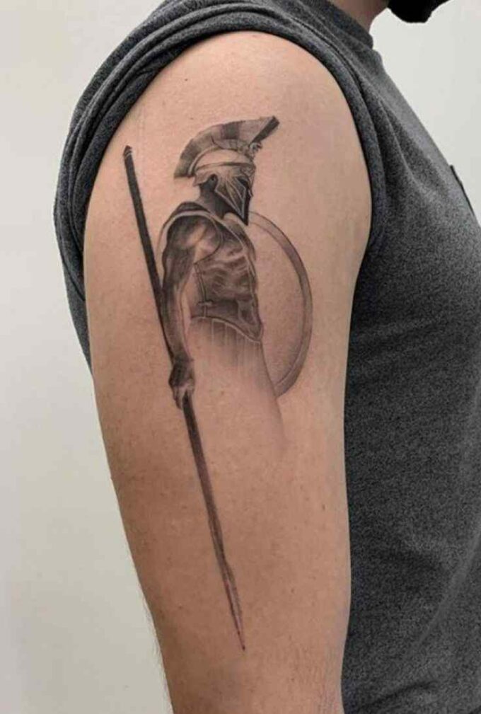 gladiator tattoo on upper arm for men