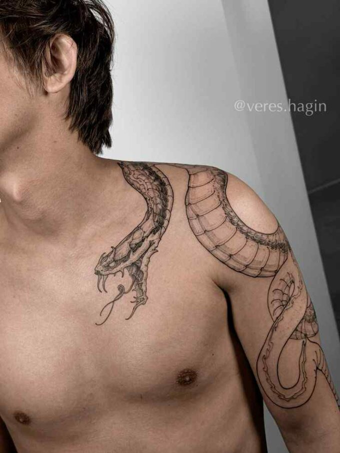 snake tattoo on upper arm for men