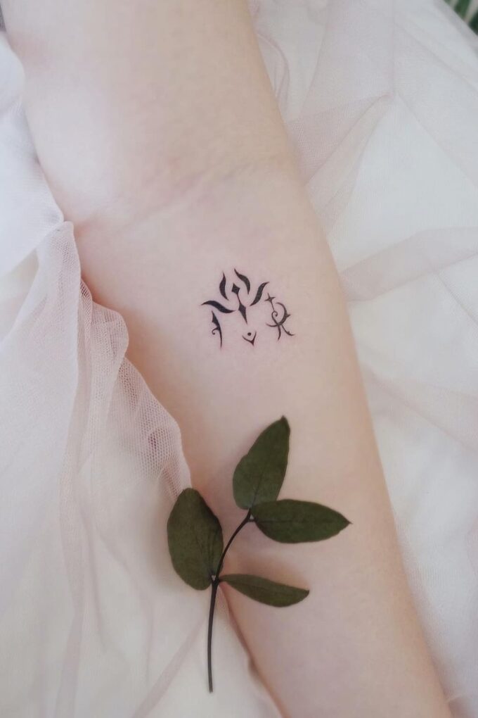 elegant virgo sign tattoo design on forearm for females
