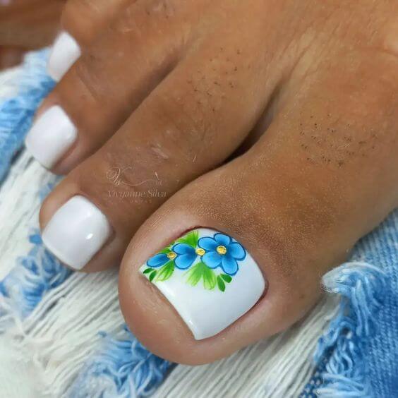 blue flowers and leaves with white toe nail designs for summer