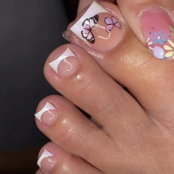 nude and butterflies on white tip summer toe nails designs
