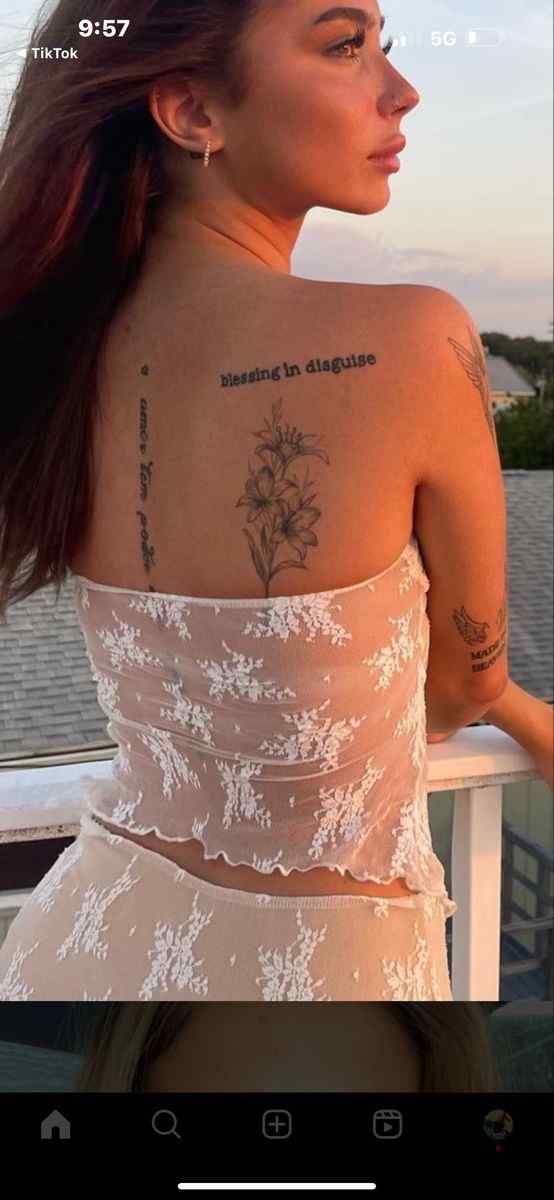 feminine flowers side back tattoo design