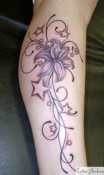 geometric style flower with stars tattoo design
