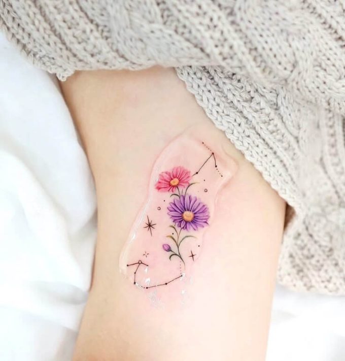 constellation stars with flowers tattoo design