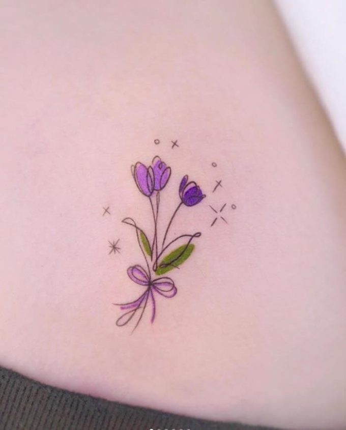 watercolor flowers and stars tattoo design