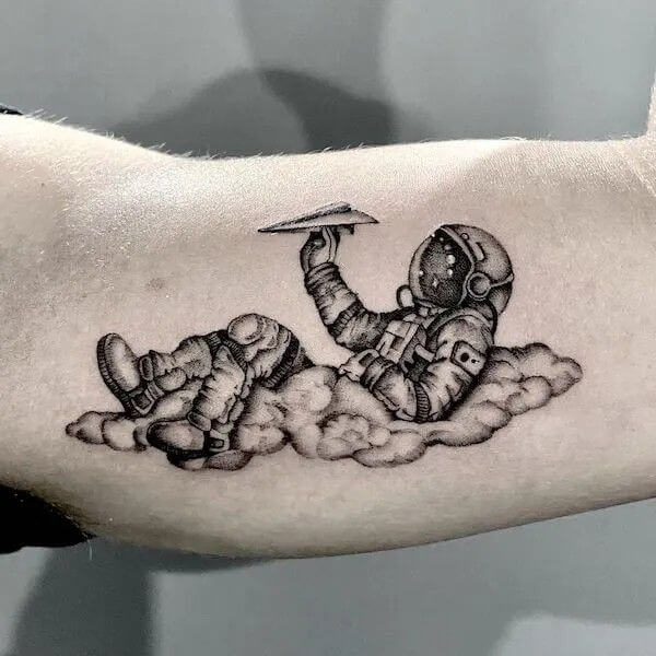 astronaut space themed tattoo design