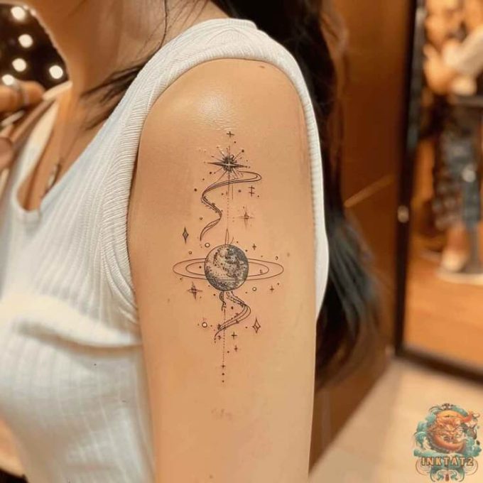 saturn planet space themed tattoo design on upper side arm