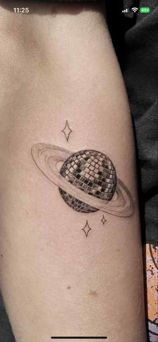 saturn space themed tattoo design