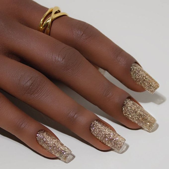 nude with gold glitter christmas nails