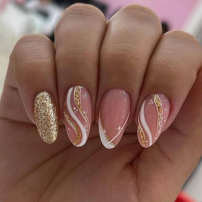 white swirls with gold glitter christmas nails designs