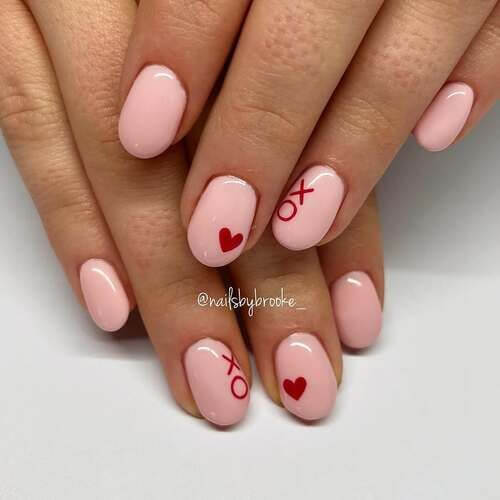 heart and xoxo on peach pink valentine nail designs