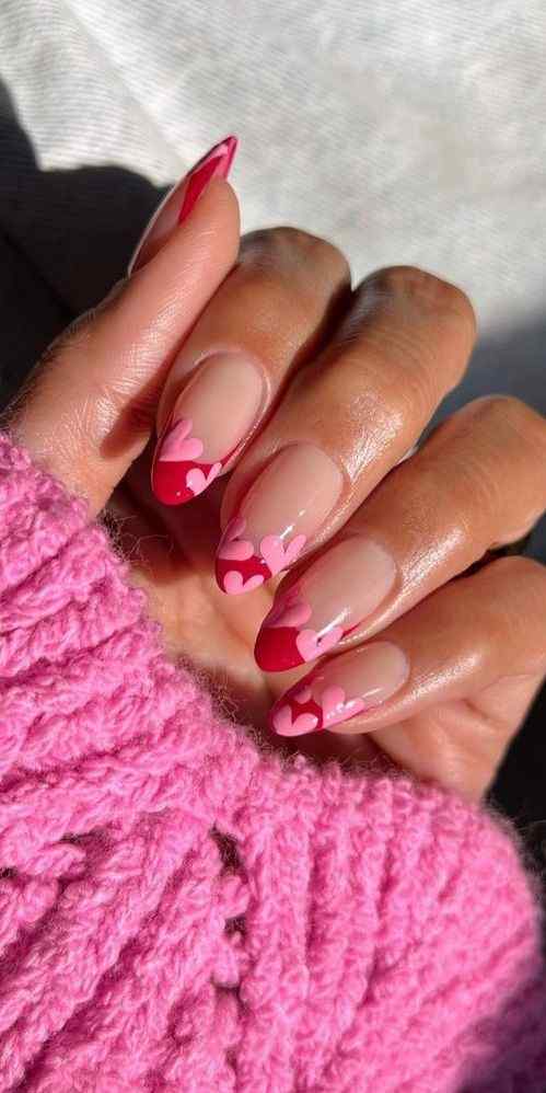 hearts on pink french tip valentines day nail designs